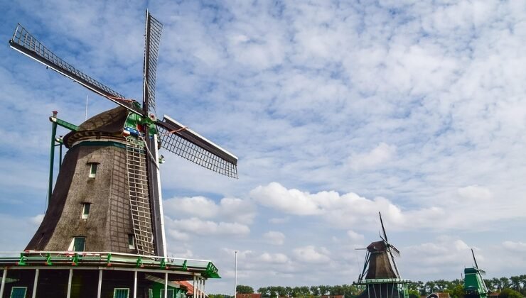 7 Easy Tips for Exploring Zaanse Schans Like a Local Zaanse Schans is one of those places that feels straight out of a Dutch storybook. With its beautifully preserved windmills, quaint green wooden houses, charming craft shops, and stunning pastoral landscapes, this historic village offers visitors a vivid glimpse into the Netherlands' rich cultural heritage. It’s a place where time seems to slow down, and every corner tells a story. But if you're truly interested in exploring Zaanse Schans in a meaningful and memorable way, it's worth taking a different approach — one that leans into authenticity. Instead of sticking to the usual tourist path, try discovering the area like a local. Not only will you find hidden gems and enjoy a more peaceful experience, but you’ll also walk away with deeper stories, unforgettable moments, and a real sense of connection to Dutch culture. Ready to elevate your journey? Here are seven easy tips for exploring Zaanse Schans like a local — from when to go and where to wander, to how to engage with the village's traditional way of life. 1. Discover the Best Time to Visit for an Authentic Experience Visit During Off-Peak Hours Timing can completely transform your experience. Many travelers miss out on the charm of exploring Zaanse Schans because they visit during the busiest hours of the day. To capture the essence of this quaint village, plan to arrive early in the morning — ideally right when it opens — or later in the afternoon, as the crowds begin to thin. The peaceful early hours bring with them a magical stillness. Without the hustle and bustle, you’ll be able to fully absorb the village’s ambiance, hear the birds chirping above the water, and take photos of iconic windmills without tourists in every shot. As the sun rises or sets over the Zaan River, the lighting becomes softer and more golden — a perfect backdrop for slow, thoughtful wandering. Choose Weekdays Over Weekends Weekends can get very busy, especially during the spring and summer months. If possible, visit on a weekday to enjoy fewer crowds and a more relaxed atmosphere. Many locals and seasoned travelers prefer midweek visits for the simple reason that they can interact more meaningfully with artisans and shopkeepers, who aren’t rushed or overwhelmed. Weekday mornings are also when school groups and tour buses are least likely to be present. This allows for a quieter, more immersive experience — and you'll have more opportunities to stop and chat with locals, whether it's a woodworker offering a spontaneous demo or a baker happy to share the history of stroopwafels. Attend Local Events and Festivals Want to experience exploring Zaanse Schans at its most festive? Time your visit around one of the village’s traditional events. The Zaanse Schans Windmill Days, typically held in May, celebrate the region’s heritage with live demonstrations, music, food stalls, and storytelling sessions. Visitors can explore working windmills, taste freshly milled flour, and witness crafts like clog-making and pewter casting in action. Other seasonal festivals — such as craft fairs or Christmas markets — offer a rich opportunity to mingle with locals, discover handmade goods, and sample traditional Dutch cuisine in an inviting atmosphere. These events transform the village into a living museum and offer some of the most rewarding ways to immerse yourself in its vibrant community spirit. 2. Explore Hidden Corners of Zaanse Schans Wander Beyond the Main Attractions Yes, the iconic windmills, cheese farms, and clog factories are must-sees, but there's so much more to discover if you're willing to stray from the main path. Instead of just following the crowd, take the time to explore the narrow back paths and lesser-known lanes. These areas are often filled with tiny gardens, art studios, and quiet benches overlooking the water. Try walking south toward the outskirts of the village, where fewer tourists venture. You'll find tranquil spots where you can sit by the river, enjoy a picnic, or simply take in the view of grazing sheep and historic wooden barns. These pockets of peace offer a more personal way of exploring Zaanse Schans, far from the hustle of tour groups. Visit Smaller, Family-Run Workshops Large-scale attractions may draw the most attention, but the real heart of Zaanse Schans lies in its intimate, family-run workshops. These spaces are often quieter and more authentic. Whether it's a fourth-generation wooden shoemaker or a small-scale cheese producer still using century-old techniques, these artisans are eager to share their craft with curious visitors. You may even stumble upon studios that aren’t on the official tourist map. If you see a hand-painted sign for handmade ceramics or specialty mustard, step inside! The owners are often delighted to share their work, tell you about their family’s legacy, and maybe even offer a sample of their creations. Seek Out Authentic Local Eateries Skip the more obvious tourist cafes near the entrance and look for hidden gems tucked into the back streets or just outside the main loop. These smaller bakeries and cafes often serve up incredibly delicious, home-style Dutch treats that you won’t find in chain establishments. Try a warm gevulde koek (a spiced almond-filled cookie), fresh apple pie, or a hearty broodje kaas (cheese sandwich made with local dairy products). Dining in these spots not only supports local businesses but adds another layer of authenticity to your experience of exploring Zaanse Schans. 3. Engage with Local Craftsmen and Artisans Participate in Hands-On Workshops One of the most enjoyable ways to deepen your visit is by learning a traditional craft first-hand. Several workshops in Zaanse Schans offer hands-on experiences, from clog-carving to cheese-making, and even tile-painting in the famous Delft blue style. These interactive sessions usually last between 30 minutes to two hours and give you the chance to create a one-of-a-kind souvenir. It’s a meaningful way to connect with the region’s traditions, and a much more memorable alternative to browsing souvenir racks. Be sure to check in advance for availability — these workshops can fill up quickly, especially in high season. Booking ahead ensures you won’t miss the chance to engage with the village’s creative heritage. Purchase Authentic Souvenirs Directly from Artisans When you buy directly from artisans, your purchase supports their work and helps sustain centuries-old crafts. Whether it’s a hand-painted tile, a wooden clog carved while you watch, or a wheel of fresh cheese sealed in wax, these items carry a personal touch that mass-produced trinkets simply don’t offer. Not only are these keepsakes more special, but many artisans will tell you the story behind the object — where the wood came from, which family member inspired the design, or how the technique has been passed down. It’s these stories that make exploring Zaanse Schans deeply enriching. Learn the Stories Behind the Crafts The crafts of Zaanse Schans aren’t just about what’s made — they’re about how and why. Every artisan has a history, and most are more than happy to share it. Ask them about their training, their materials, and the significance of their craft in Dutch culture. You might learn that a certain weaving pattern was traditionally used in wedding garments or that a paint pigment is made using regional clay. These insights breathe life into the objects you take home and offer a deeper understanding of the village itself. What may seem like a simple souvenir becomes a vessel for culture, memory, and tradition. 4. Master the Art of Local Transportation Use Biking to Explore Effectively One of the best ways of exploring Zaanse Schans like a local is on two wheels. Biking is deeply ingrained in Dutch life, and the village is designed with cyclists in mind. Rent a bike from a local shop and pedal your way along scenic trails that wind through meadows, past windmills, and over small wooden bridges. There’s a dedicated cycling route called the Zaanse Schans Windmill Route, which takes you through the surrounding countryside and connects nearby villages such as Zaandijk and Wormerveer. It’s a refreshing, eco-friendly, and authentic way to see more of the region at your own pace. Take the Nelson Flight or Local Bus If you’re short on time or looking for a different perspective, consider hopping on a boat tour or a local bus. The Nelson Flight (a popular sightseeing boat) lets you explore the waterways and see Zaanse Schans from a completely different angle — all while enjoying a relaxing ride. Alternatively, take one of the regional buses from Amsterdam or Zaandam. They’re convenient, affordable, and provide a more local commuting experience than a private taxi. Walk the Village for a Closer Look Don’t underestimate the joy of walking. Strolling through Zaanse Schans allows you to notice small details — like hand-carved house signs, flower boxes bursting with tulips, and curious ducks waddling by the dikes. On foot, you can pause whenever something catches your eye and take your time exploring. Walking also opens the door to spontaneous conversations, impromptu photo ops, and quiet reflection — essential ingredients in any meaningful journey. 5. Respect Local Customs and the Environment Follow Responsible Tourism Guidelines Zaanse Schans is not just a tourist attraction — it’s a living village with real residents. Be respectful by staying on designated paths, not entering private homes or gardens, and obeying posted signs. These simple acts of consideration help maintain the harmony of the area. Dispose of your trash properly, avoid feeding animals, and stick to eco-friendly behaviors. This not only helps protect the environment but also sets a positive example for other visitors. Support Sustainable and Ethical Tourism Choose local guides, eco-certified tours, and handmade goods over imported souvenirs. Read up on the area’s ecology and history before you go, so you can better appreciate the delicate balance that makes this place so special. Supporting sustainability ensures that future generations will also have the chance to enjoy exploring Zaanse Schans in all its natural and cultural beauty. Be Courteous and Engage Respectfully A smile and a friendly "Hallo!" go a long way. Ask permission before taking someone’s photo, and take a moment to thank artisans and shopkeepers who’ve shared their time or craft with you. Building these human connections makes travel more meaningful. Locals are far more likely to open up when treated with respect and curiosity. 6. Maximize Your Visit with Local Tips and Resources Use Official Tour Guides and Maps Pick up a printed guide at the entrance or download an app from the Zaanse Schans official website. These resources often highlight under-the-radar spots, special exhibits, and seasonal events. They’ll help you create your own itinerary while also allowing room for spontaneity. Some guides even include audio tours narrated by locals, providing fascinating context as you explore each area. Consult Local Tourism Offices The staff at local information centers are invaluable sources of knowledge. Ask them for recommendations on new shops, upcoming workshops, or peaceful walking trails. They often know which attractions are temporarily closed, which ones are newly opened, and where you can find a quiet place to watch the sunset. Read Blogs and Forums for Up-to-Date Insights Travel blogs and forums like TripAdvisor or Reddit can give you the most current, firsthand insights into what to expect during your visit. Bloggers who specialize in the Netherlands or cultural tourism often post updates about hidden gems, new attractions, or personal itineraries that can inspire your own. By combining local insight with real-time traveler experiences, you can shape your journey in a way that’s both informed and uniquely yours. Conclusion: Your Journey to the Heart of Dutch Heritage In the end, exploring Zaanse Schans like a local isn’t just about avoiding crowds or seeing different sights — it’s about changing your perspective. By choosing slower, more thoughtful travel, you open yourself up to genuine experiences, rich cultural interactions, and moments of quiet beauty. Whether you’re biking past windmills, chatting with a shoemaker, or savoring a homemade stroopwafel from a hidden café, every step you take through Zaanse Schans becomes part of a story — your story. One that’s built not just on what you saw, but how you experienced it. So skip the rush, embrace the pace, and let Zaanse Schans reveal its magic, one quiet discovery at a time.