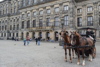 Dam square with Amsterdam city tours hop on hop off