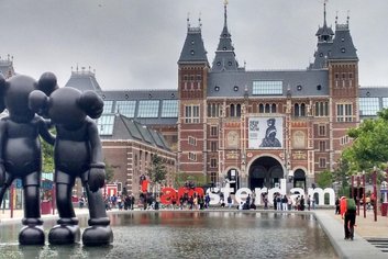 Museum Square is shown by Amsterdam Summer Travel Guide
